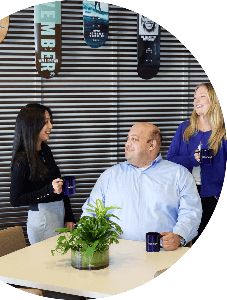 team members sitting in office