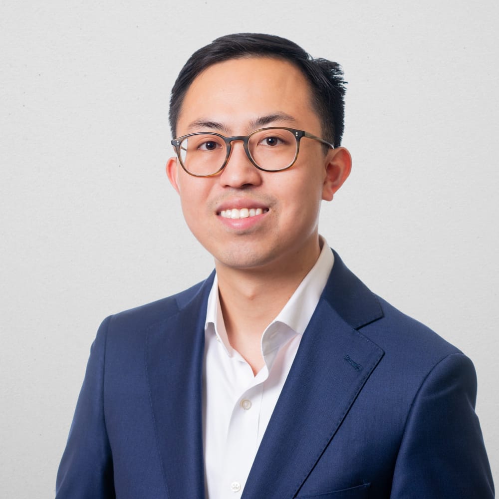 headshot of Raymond Cen